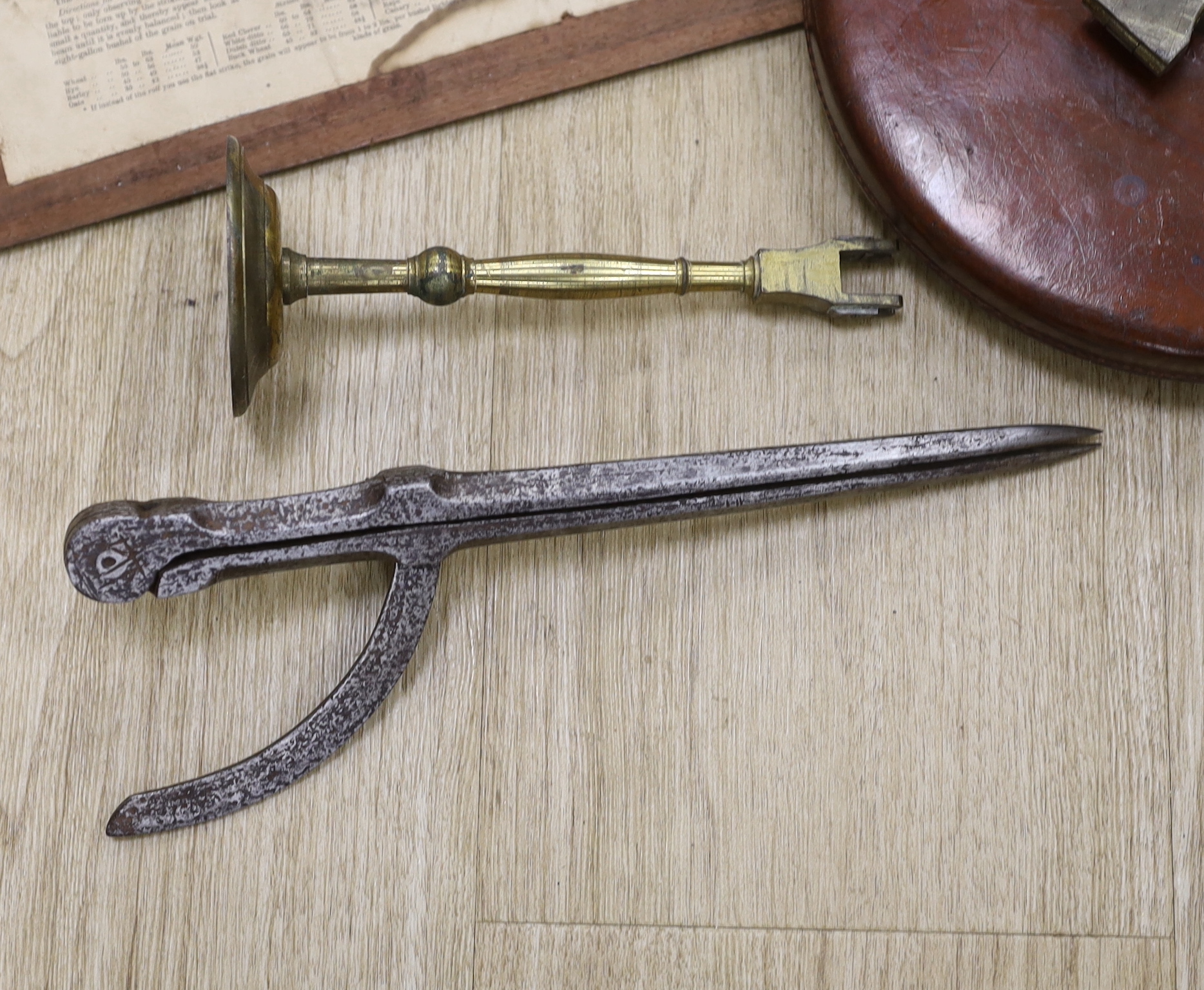 A late Georgian Marratt & Short Improved Chondrometer, a large surveyor's measure and a cast iron protractor